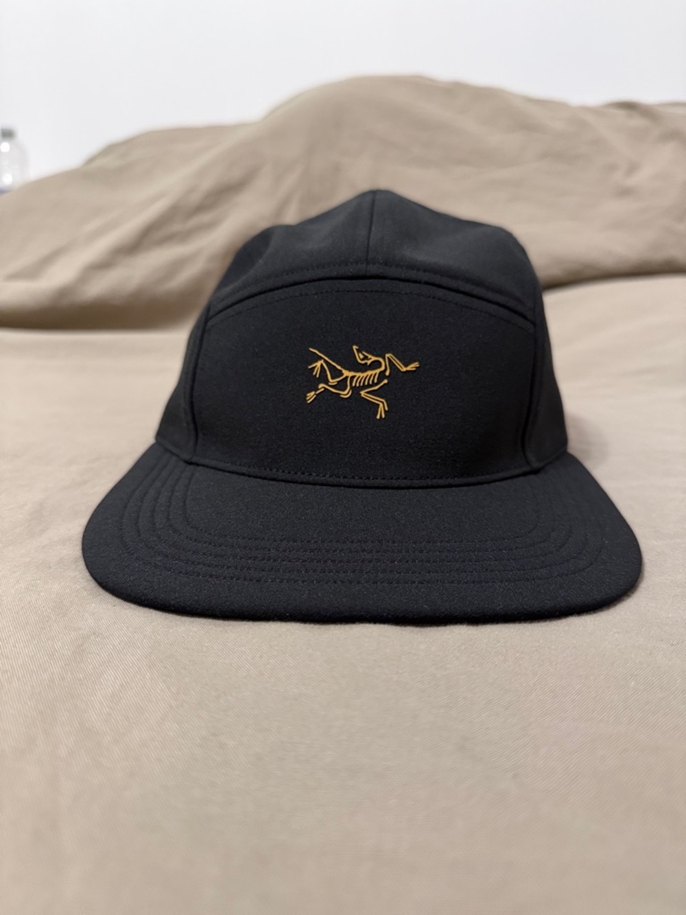 Arc'teryx Black Cap with Gold Arc Logo